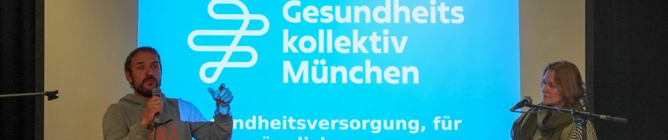 Zwei Personen auf einer Bühne vor Publikum auf der Auftaktveranstaltung des Geko Münchens
